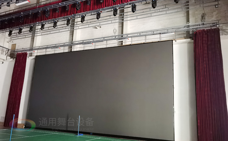 廣州黃花崗禮堂選擇通用舞臺！禮堂舞臺阻燃幕布、吊桿、舞臺燈光項目圓滿竣工！